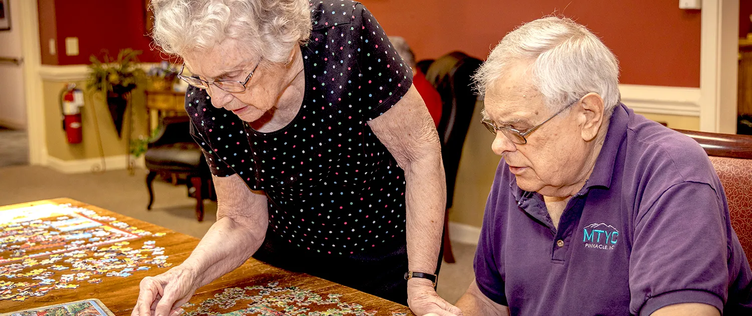 Friends working together on a puzzle